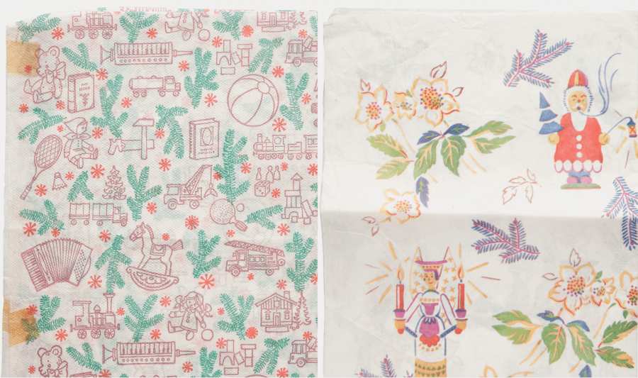 Two different types of wrapping paper with Christmas motifs