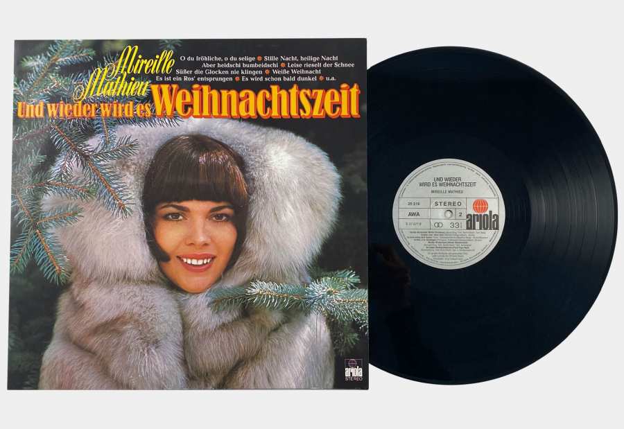 Schallplatte »Und wieder wird es Weihnachtszeit«. Aufdruck von Mireille Mathieu zwischen Tannenzweigen.