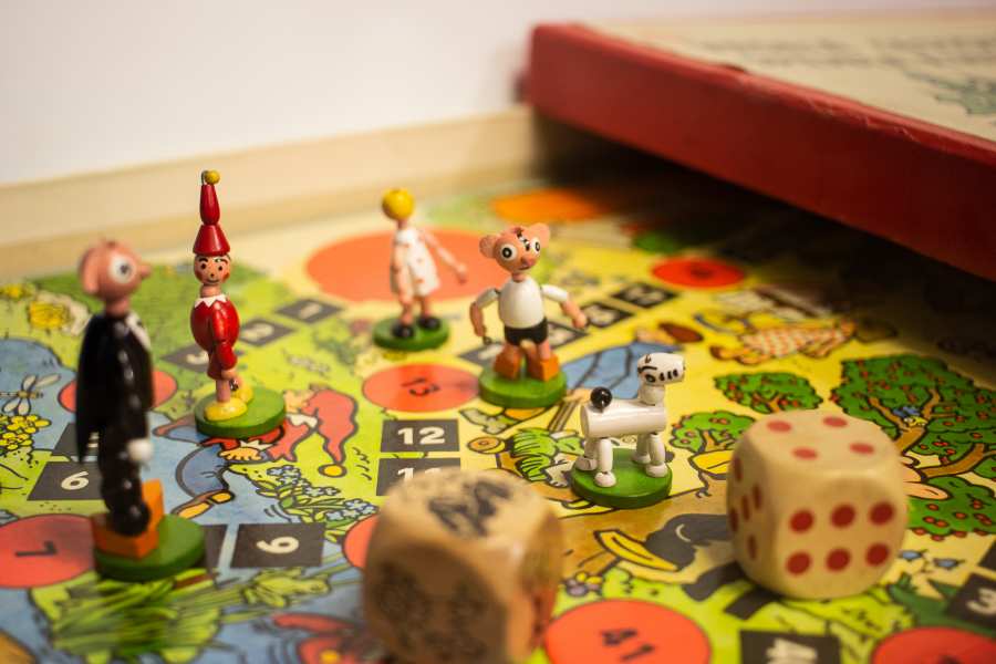 Close-up of the board game »Merry Travels — Spejbl and Hurvinek« displayed at the exhibition