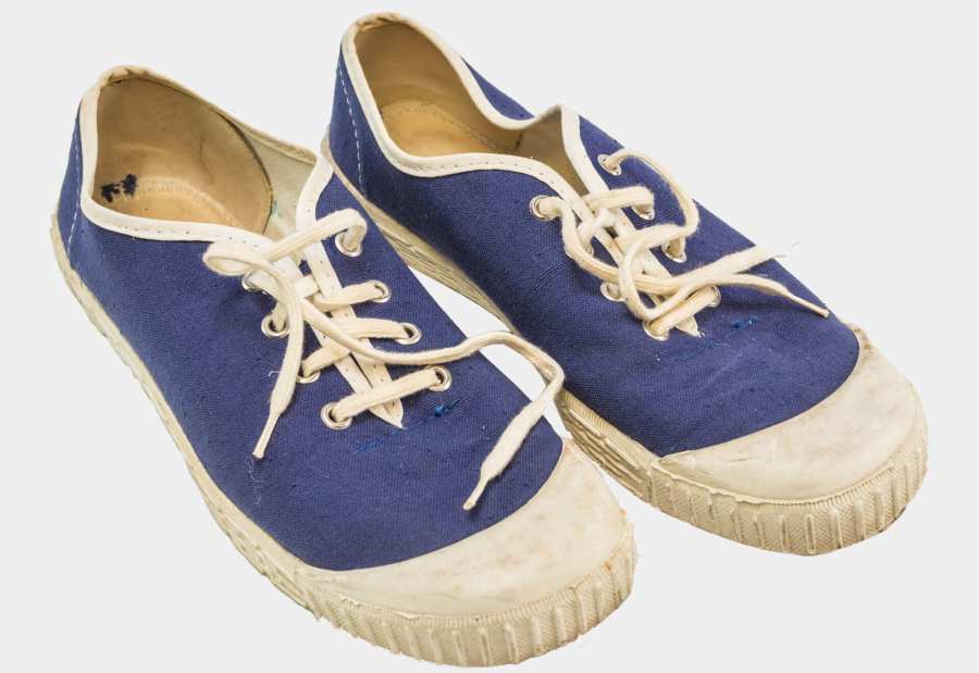 One pair of blue indoor sports shoes made of synthetic fibre and canvas with white rubber sole